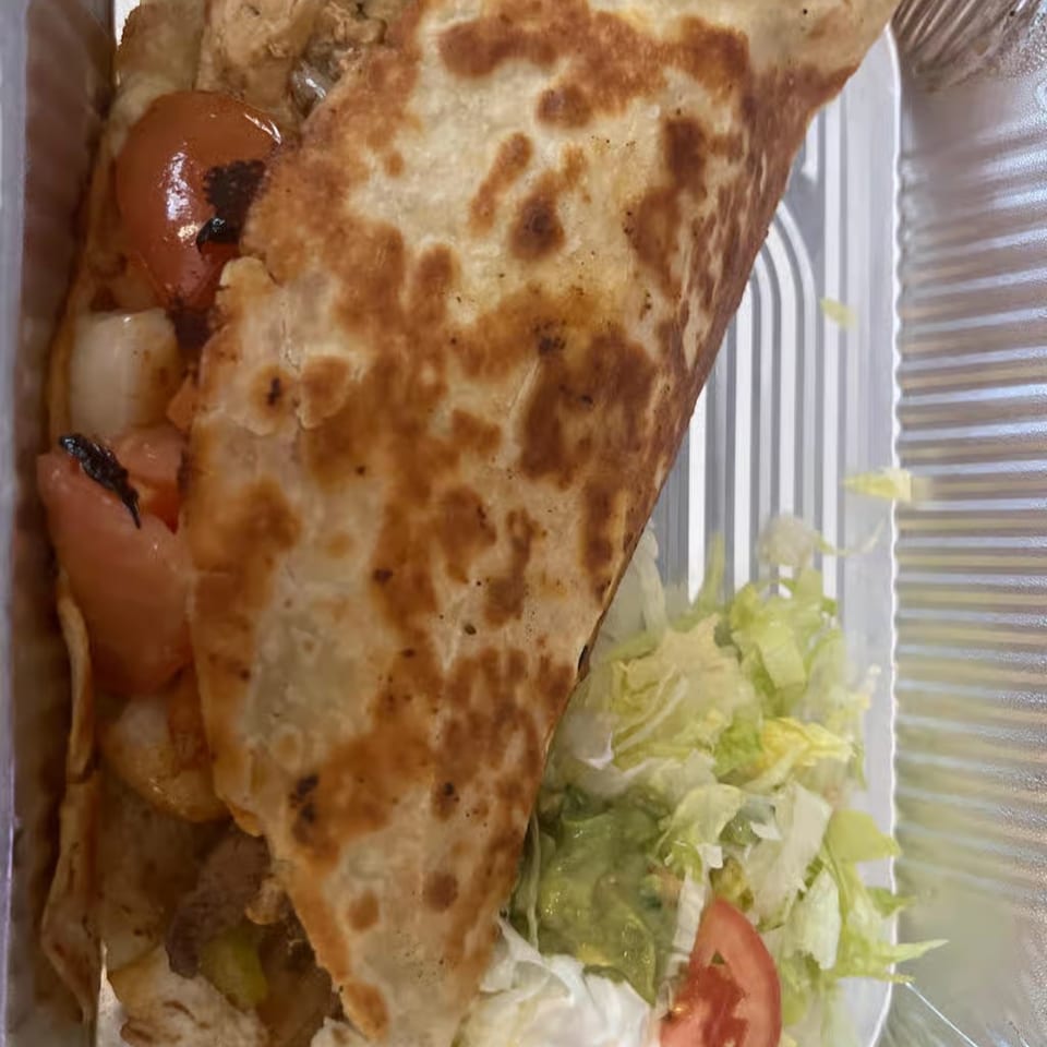 Indulge in Our Quesadilla